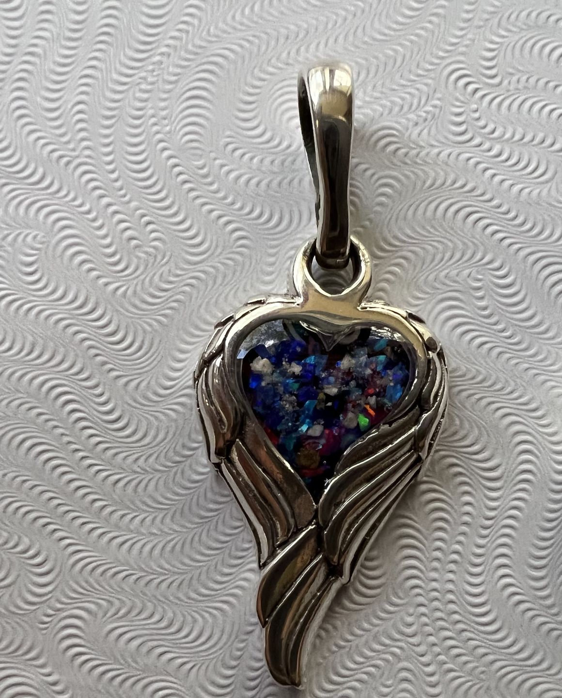 Customer photo review of Petite Angel Wing Pendant - Engravable