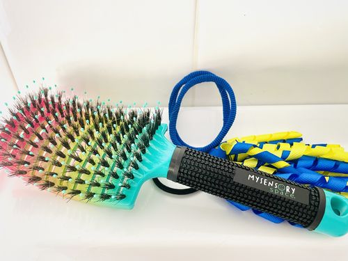 Customer photo review of My Sensory Space Detangler Hairbrush