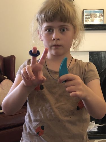 Customer photo review of ARK's Saber Tooth Chew Necklace