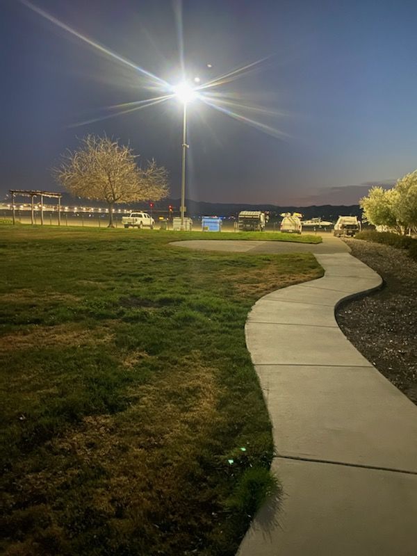 Customer photo review of LED Pole Light 150W, High Voltage, 5700K, Universal Mount, 200-480V With Photocell Bronze, Dusk to Dawn Parking Lot Lights
