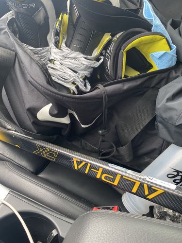 Customer photo review of Warrior Alpha DX Senior Hockey Stick (Gold)