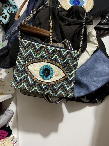 Customer photo review of Grecian Nights Evil Eye Clutch