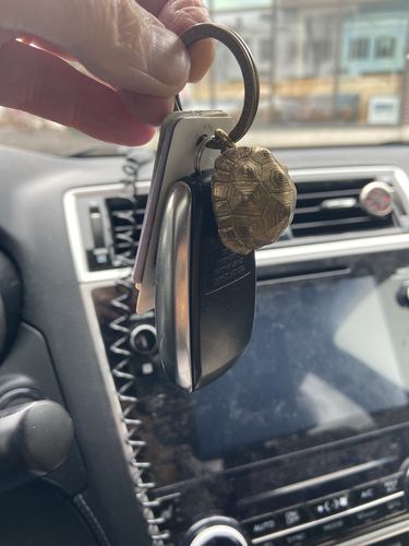 Customer photo review of Tortoise Bell Pendant | Brass