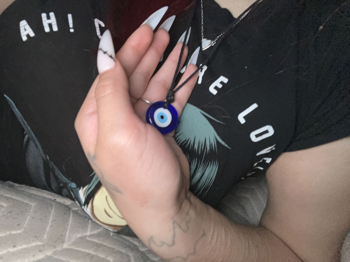 Customer photo review of Glass Evil Eye Good Luck and Protection Necklace