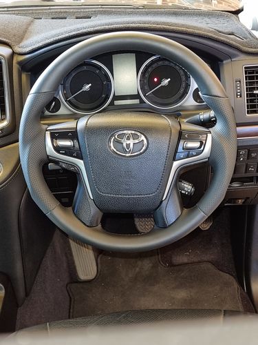 Customer photo review of Sports Black Leather with Perforated Sides Steering Wheel suit Toyota LandCruiser 70 200