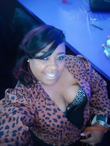 Customer photo review of Leopard Print Deep V Sweet Blouse