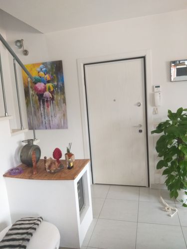 Customer photo review of Passeggiata sotto la pioggia