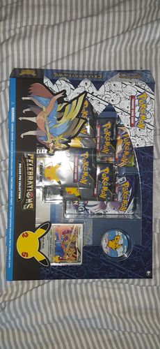 Customer photo review of Pokemon Trading Card Game: Celebrations Deluxe Pin Collection