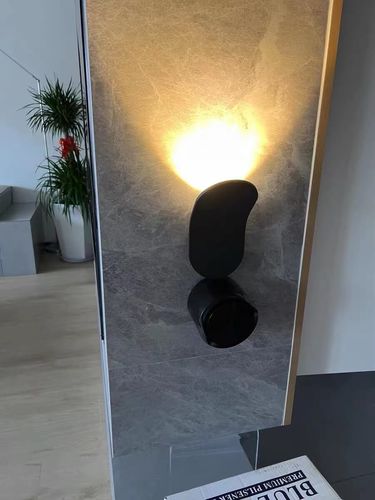 Customer photo review of Minimalist Modern Wall Sconce in Black/White Finish