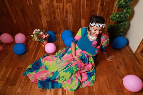 Customer photo review of Vibrant Rainbow Maternity Flow Dress