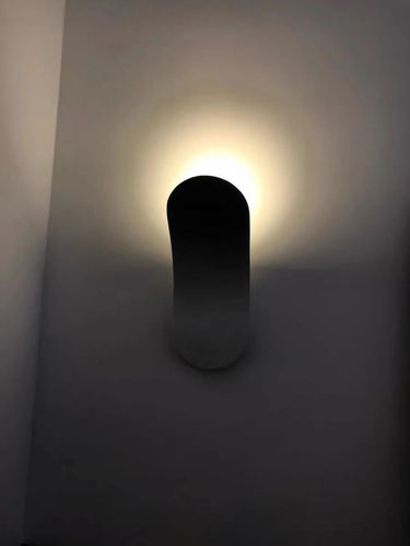 Customer photo review of Minimalist Modern Wall Sconce in Black/White Finish