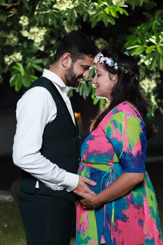 Customer photo review of Vibrant Rainbow Maternity Flow Dress