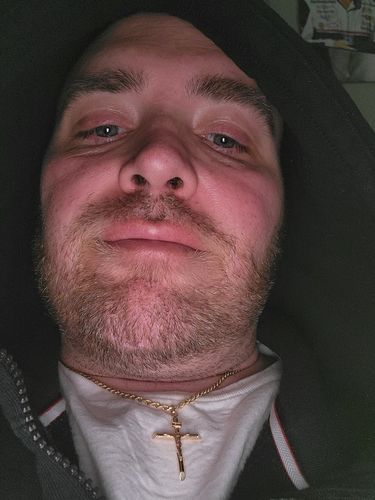 Customer photo review of Gold Stainless Steel Crucifix Necklace