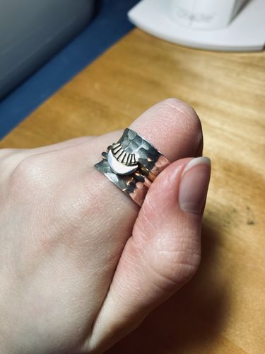 Customer photo review of Sun and Moon Spinner Ring