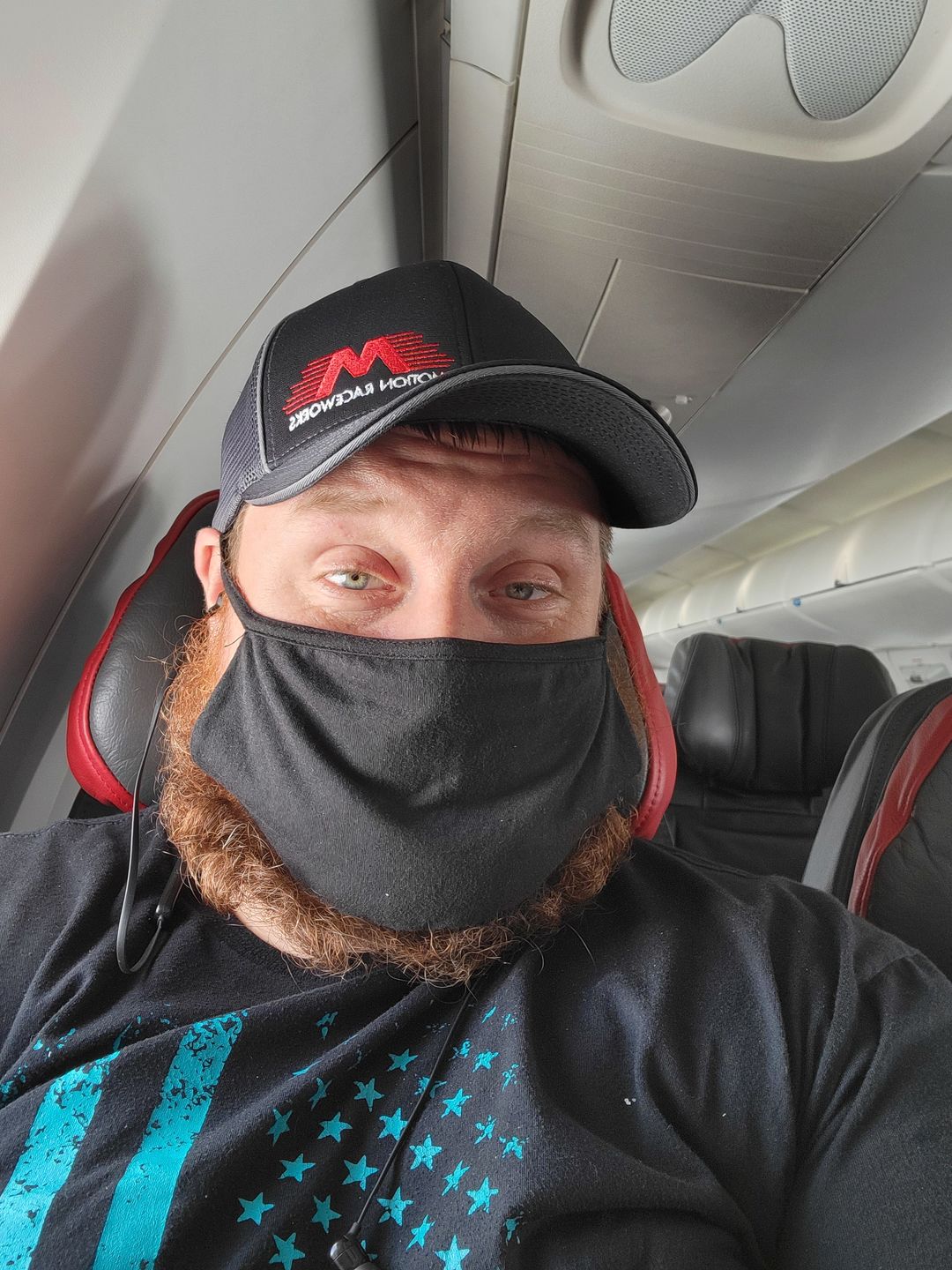 Customer photo review of Black and Grey Flex Fit Mesh Trucker Hat S/M & L/XL