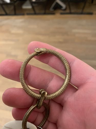 Customer photo review of Ouroboros Keychain | Brass