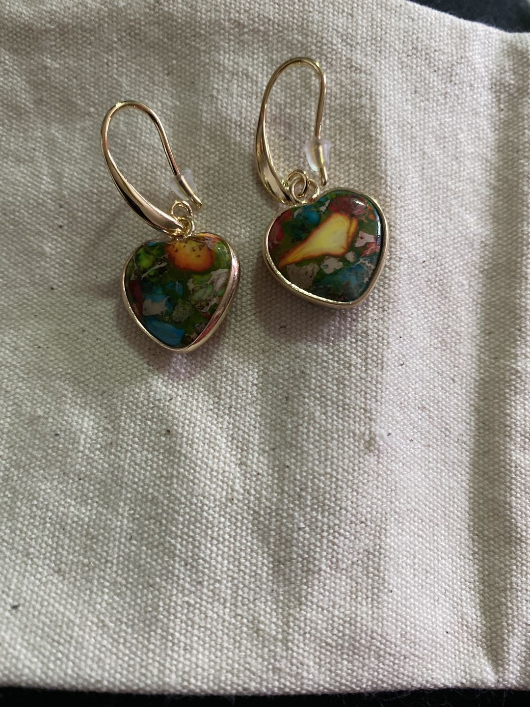 Customer photo review of Divine Warrior Heart Earrings