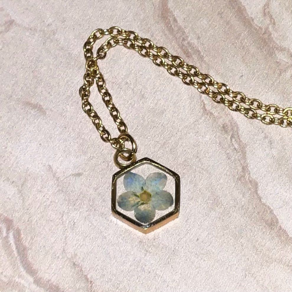 Customer photo review of Matthew 17:20 Forget Me Not Necklace