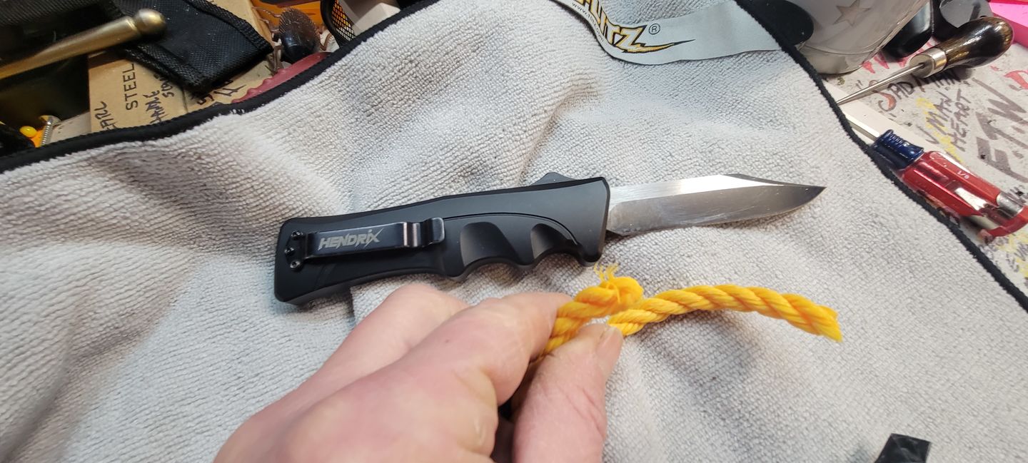 Customer photo review of *New Arrival* Black D2 Clip Point Mamba Hendrix OTF
