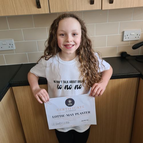 Customer photo review of We Don't Talk About Bruno No Matching White T-Shirts