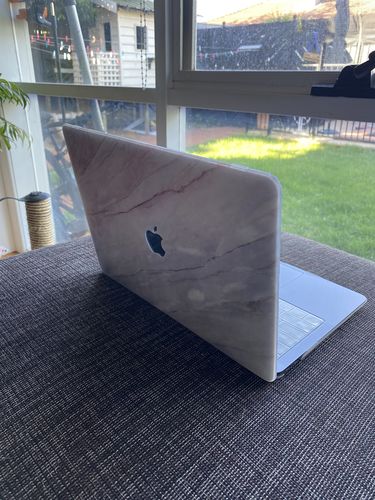 Customer photo review of Marble White With Apple Cut Out Logo - Macbook Case - Macbook Air Pro 13" inch  + Free Keyboard Cover