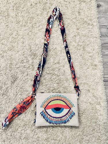Customer photo review of Lazy Daze Evil Eye Clutch