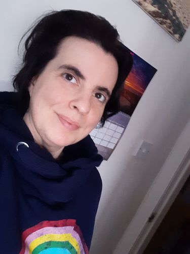 Customer photo review of Distressed Navy Rainbow Cowl Neck Hoodie