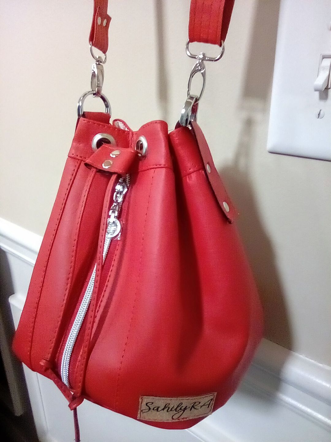 Customer photo review of #5 Dangle Hoop Pulls