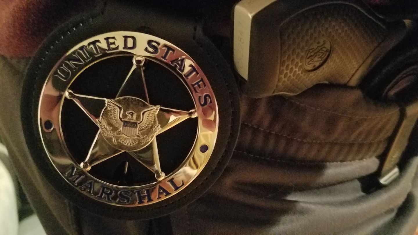 Customer photo review of US Federal Court Law Enforcement MARSHAL Badge Solid Copper Replica Movie Props