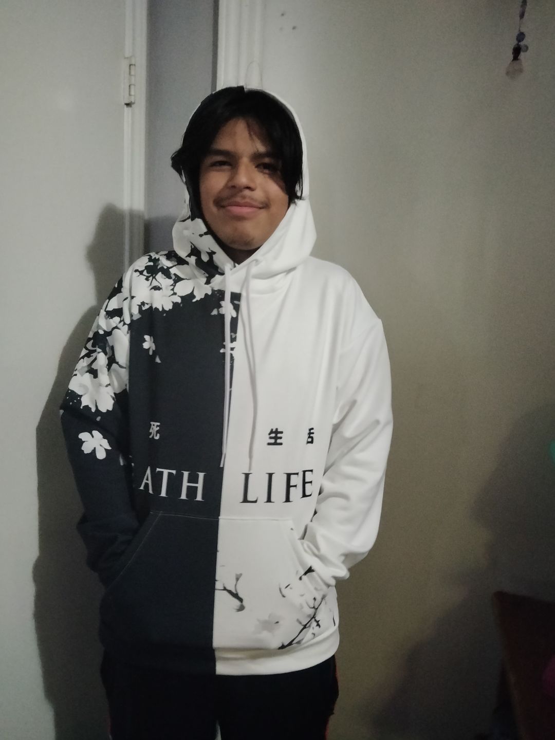 Customer photo review of Death & Life Hoodie