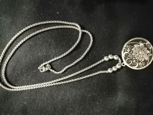 Customer photo review of Collier avec pendentif en Fleur de Lotus