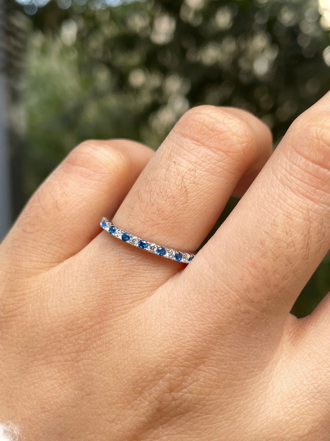 Customer photo review of Louily 0.3 CT Round Cut Half Eternity Blue And White Sapphire Wedding Band For Women In Sterling Silver