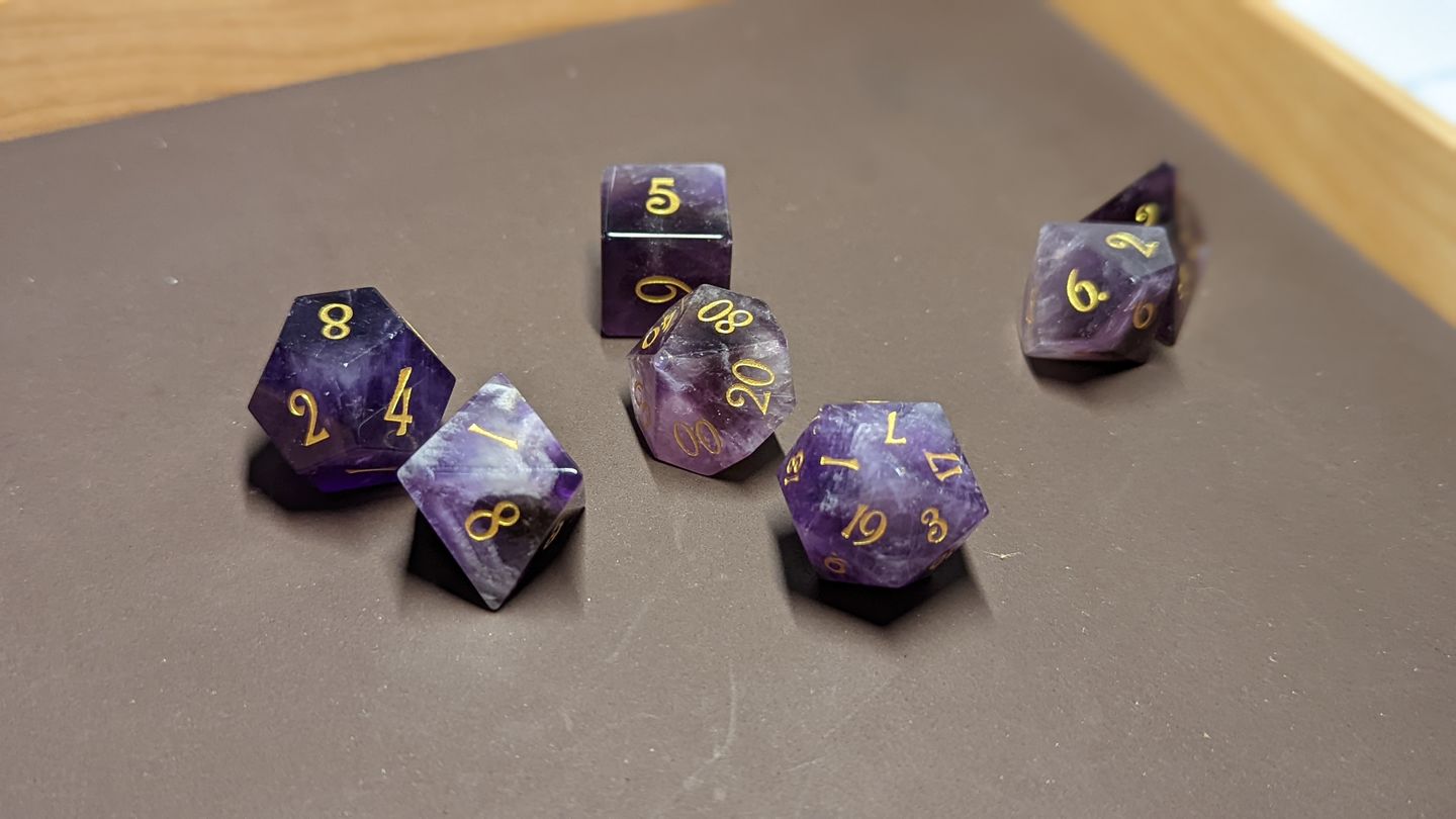 Customer photo review of URWizards D&D Amethyst Gemstone Engraved Dice Set