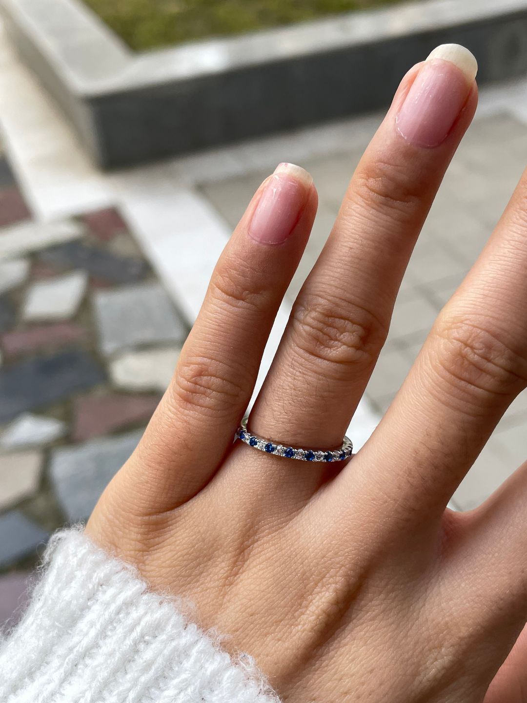 Customer photo review of Louily 0.3 CT Round Cut Half Eternity Blue And White Sapphire Wedding Band For Women In Sterling Silver