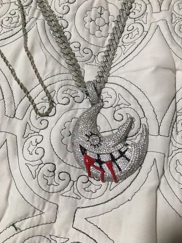 Customer photo review of Iced Out Crescent Moon Pendant