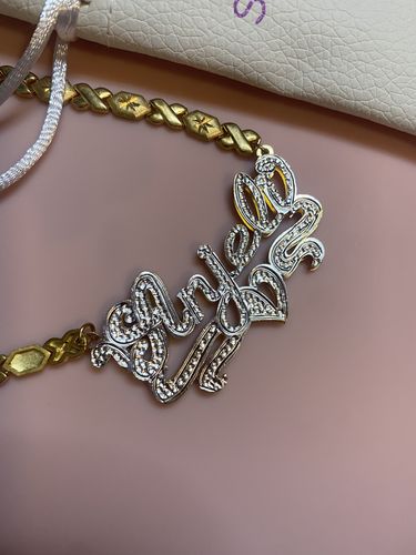 Customer photo review of Double Plated Heart Name Necklace with Hugs and Kisses Chain