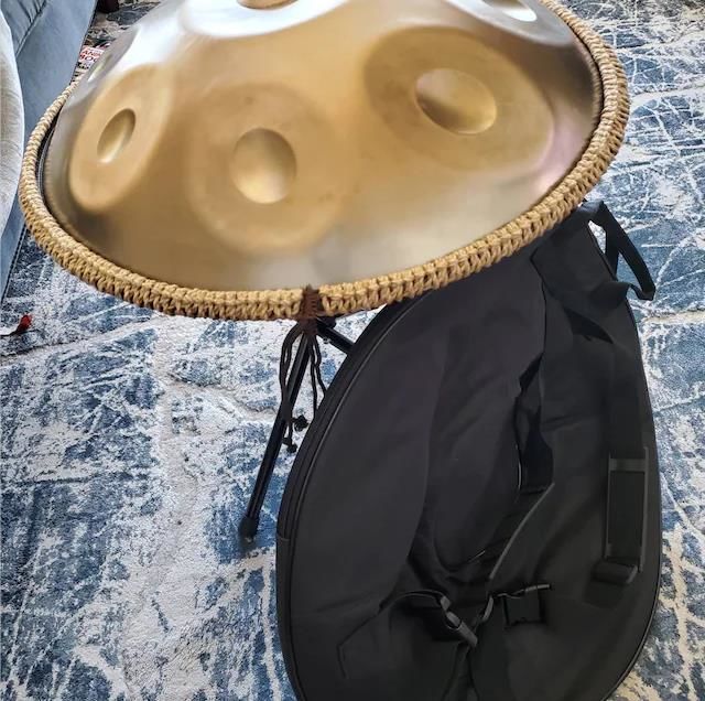 Customer photo review of AS TEMAN Handpan Pure Golden 9 Notes D Minor Scale Handpan drum with gift set