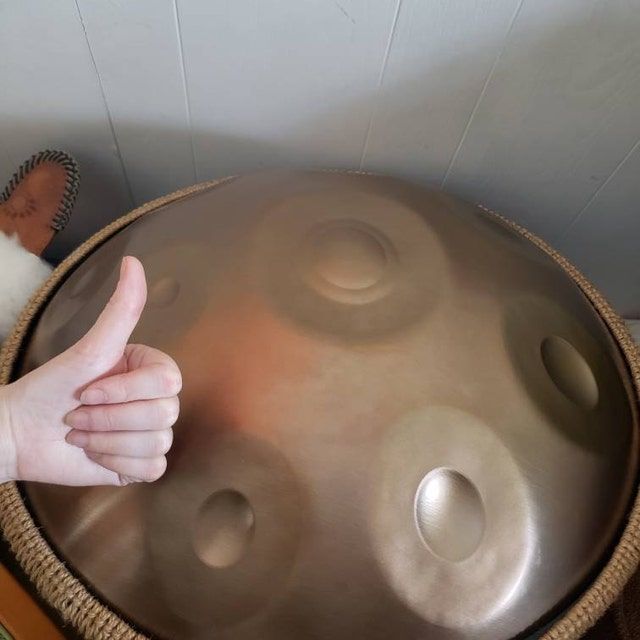 Customer photo review of AS TEMAN Handpan Pure Golden 9 Notes D Minor Scale Handpan drum with gift set