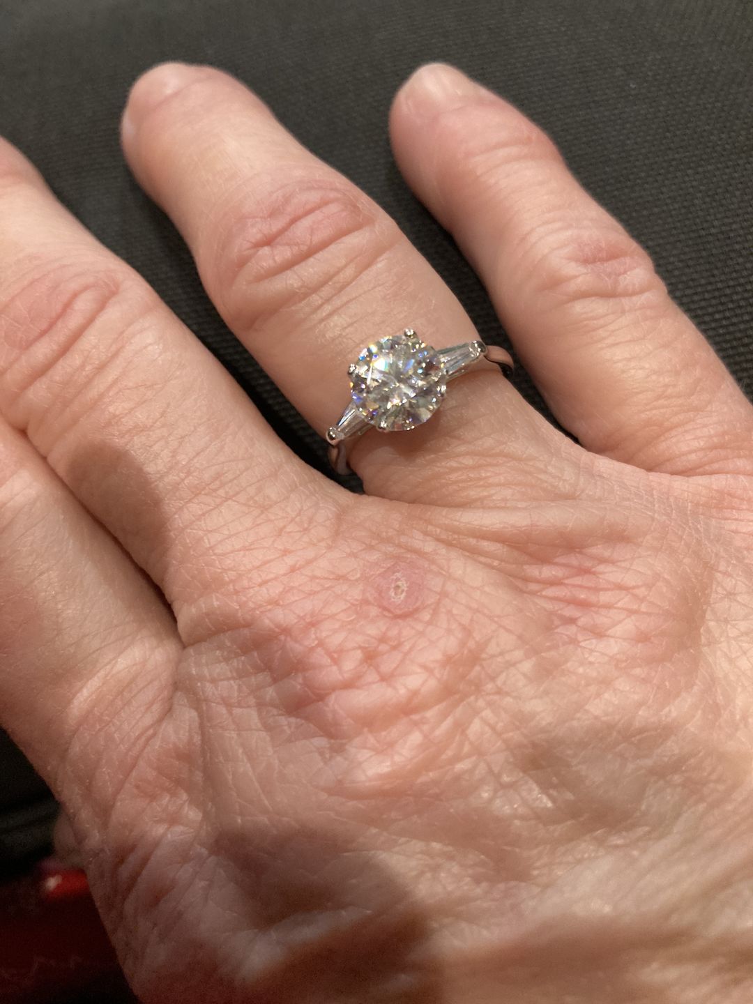 Customer photo review of Three Stone Round Moissanite Tapered Baguette Engagement Ring