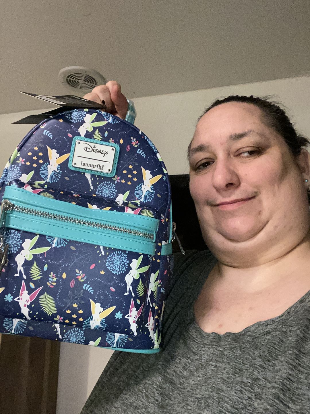 Customer photo review of 707 Street Exclusive - Disney Tinkerbell Glow in the Dark Allover Print Mini Backpack w/ Teal Straps - December Preorder