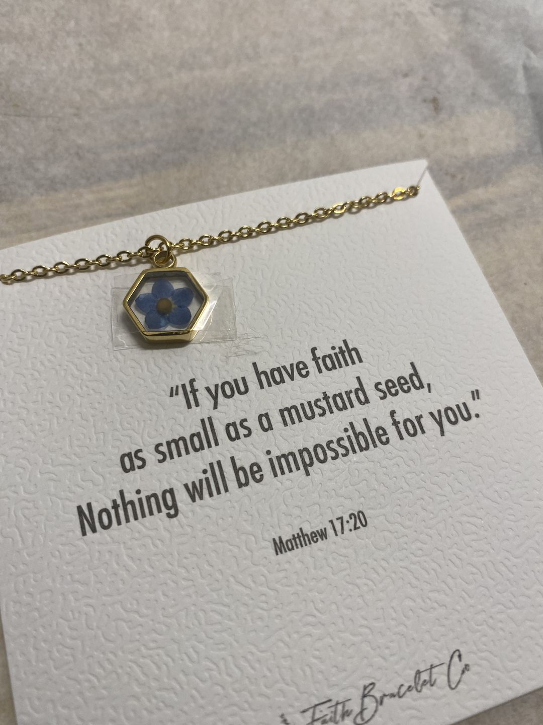 Customer photo review of Matthew 17:20 Forget Me Not Necklace