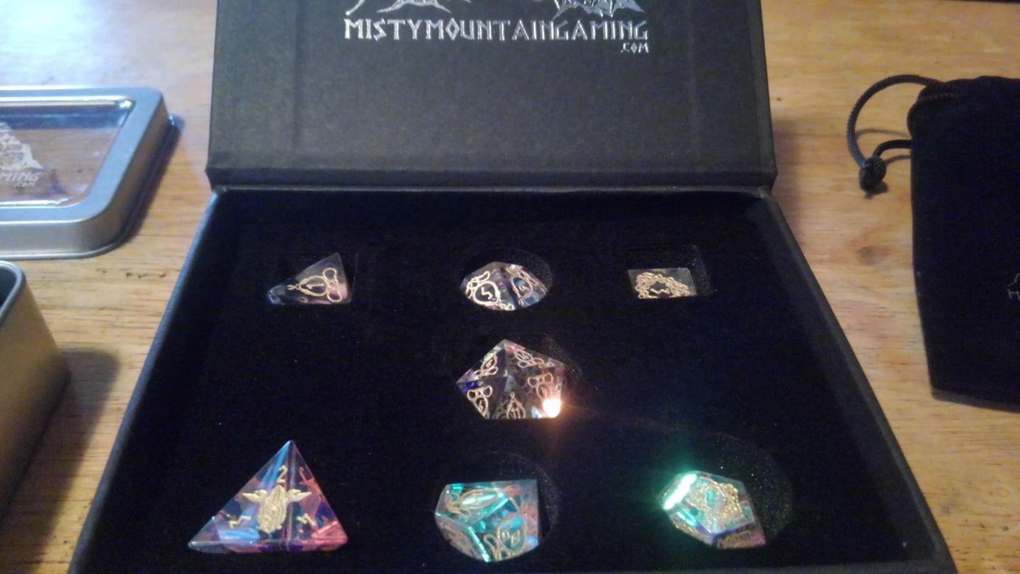Customer photo review of SERPENT OF MIDGARD PRISM GLASS DICE SET