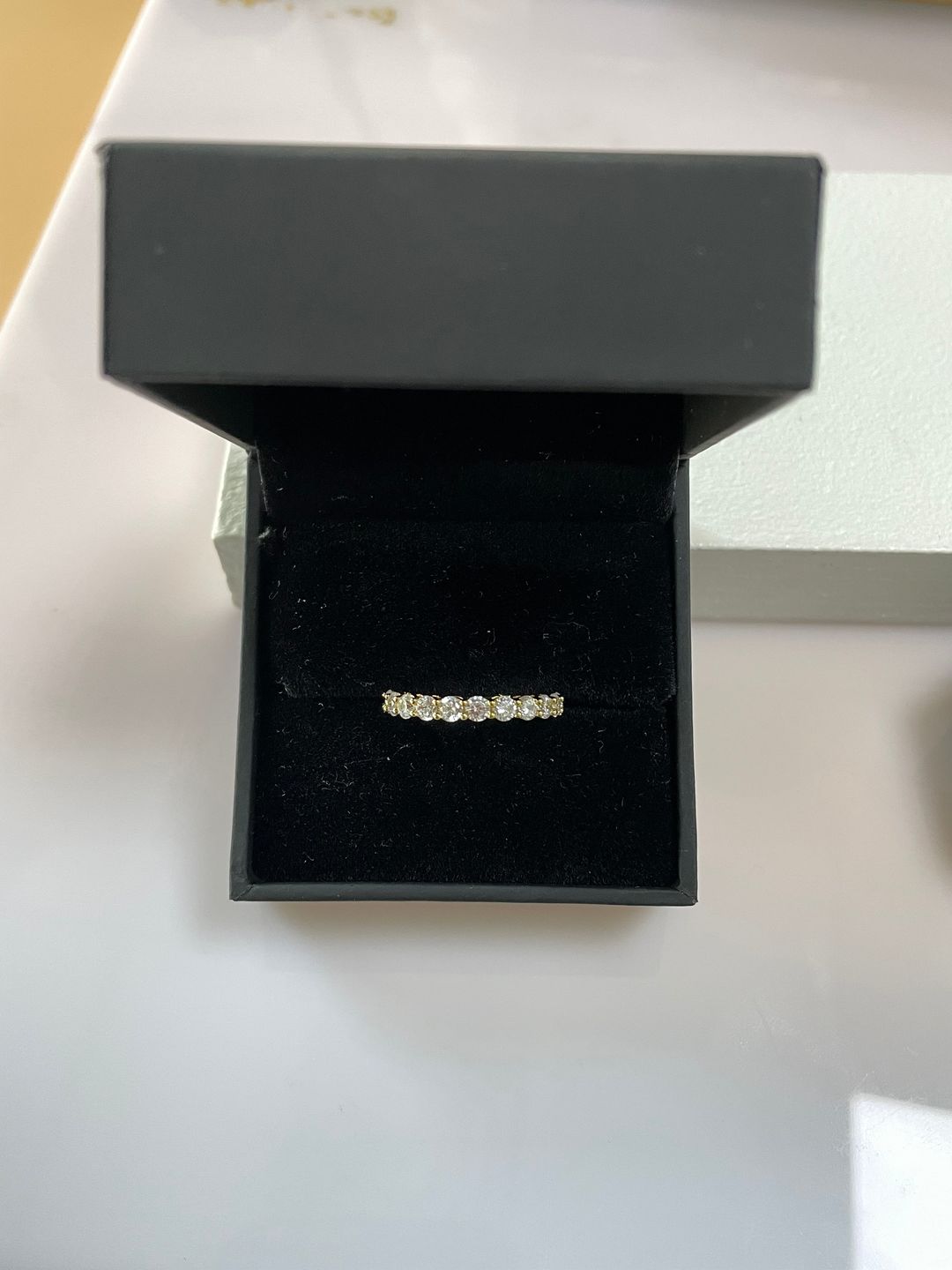 Customer photo review of Louily Eternity Round Cut Simulated Diamond Wedding Band In Sterling Silver