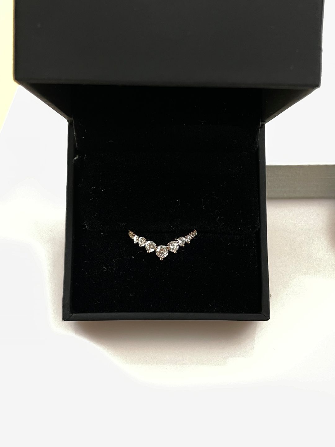 Customer photo review of S925 0.5Ct Round Cut Unique Curved Design Thin Stacking Wedding Ring In Sterling Silver