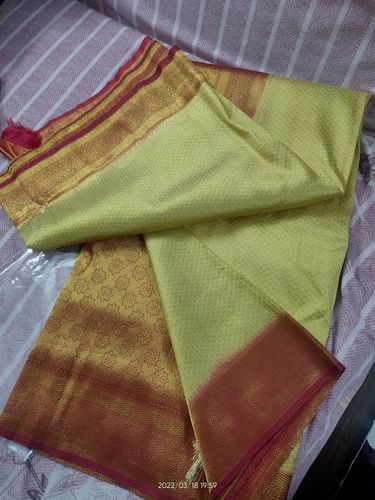 Customer photo review of Frost White Orange Kanjivaram Saree