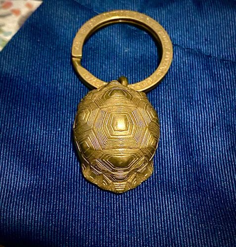 Customer photo review of Tortoise Bell Pendant | Brass