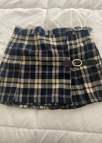 Customer photo review of Gossip Goes Around Mini Skirt