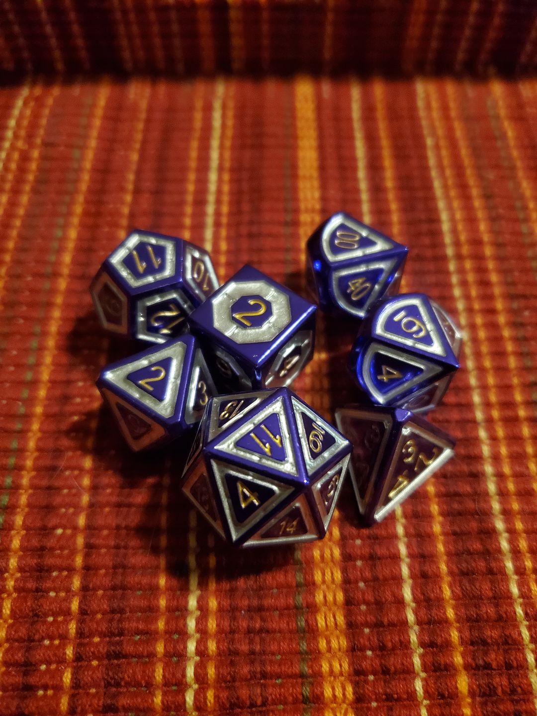 Customer photo review of CLERIC'S DOMAIN PURPLE AND SILVER METAL DICE