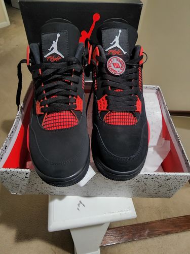 Customer photo review of Air Jordan 4 “Red Thunder”