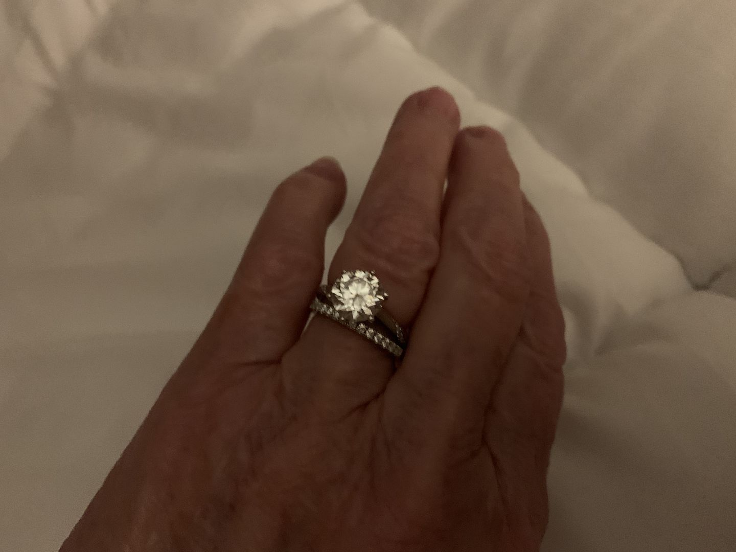 Customer photo review of Moissanite Round Half Eternity Sterling Silver Wedding Band Stackable Ring